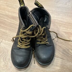 Dr. Martens Black Leather Boots with Gold Accents